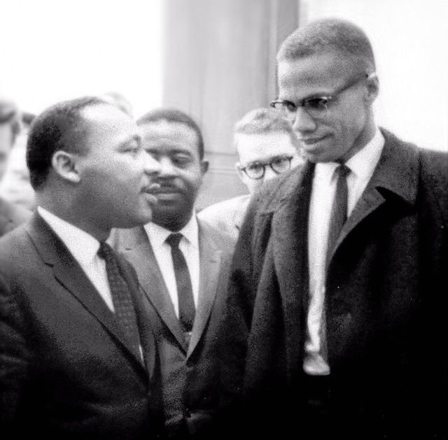 Martin Luther King and Malcolm X before press conference, March 26, 1964