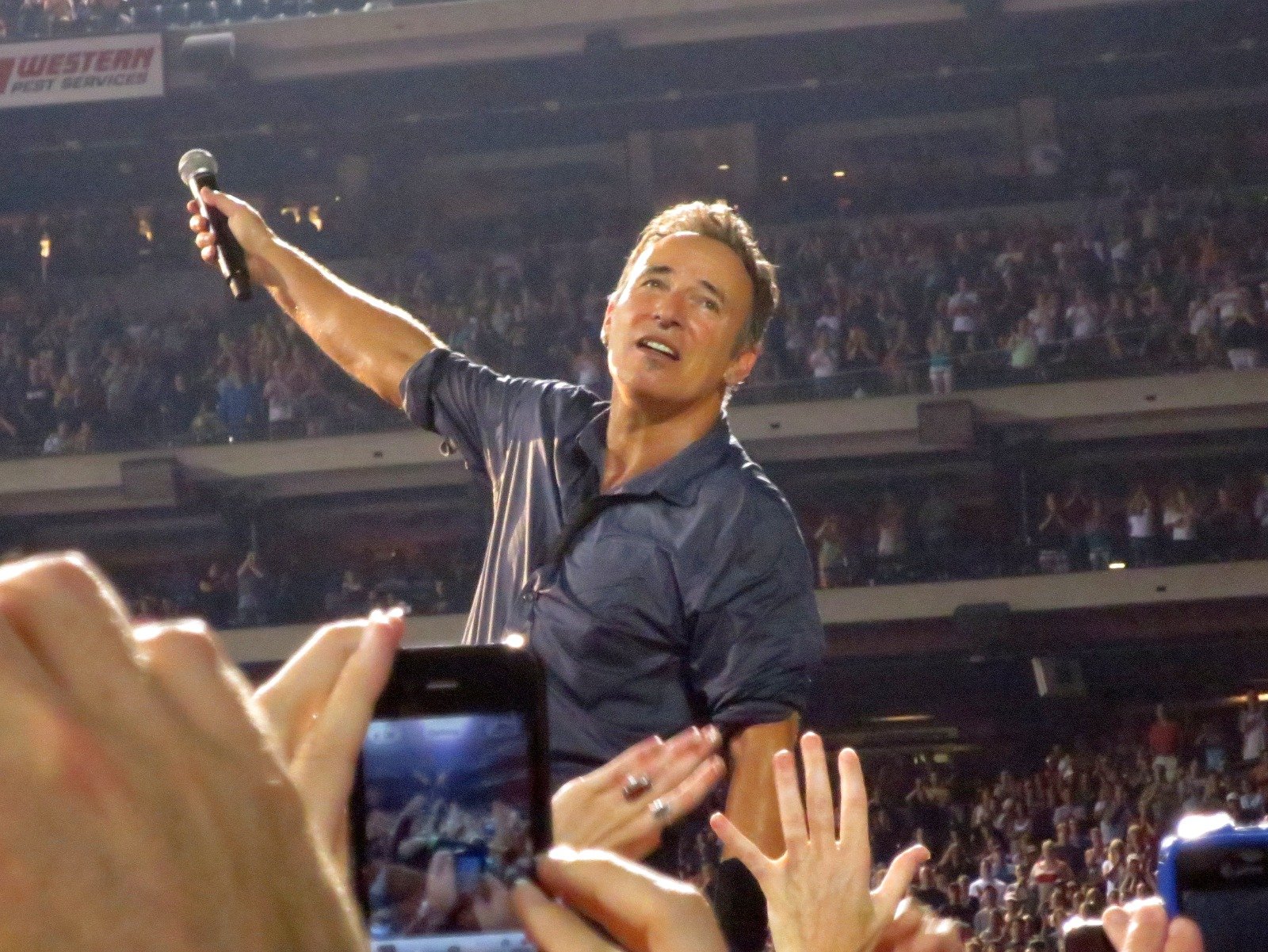 "Bruce Springsteen and the E Street Band" by New York + Philly Live! is licensed under CC BY-SA 2.0.