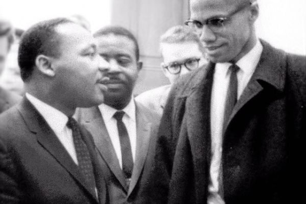 Martin Luther King and Malcolm X before press conference, March 26, 1964